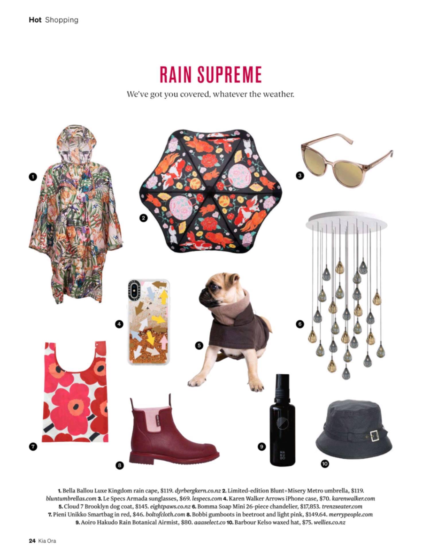 magazine editorial of essential rain gear included merry people beetroot boots